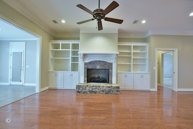 4701 Turnberry Ln Unit 6, Columbus, GA 31909 - unfurnished living room with light hardwood / wood-style floors, crown molding, a stone fireplace, and ceiling fan