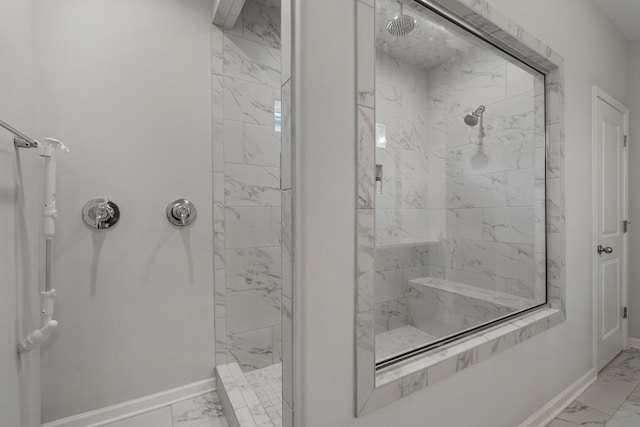 bathroom featuring tiled shower