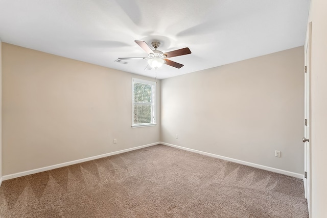 carpeted empty room with ceiling fan