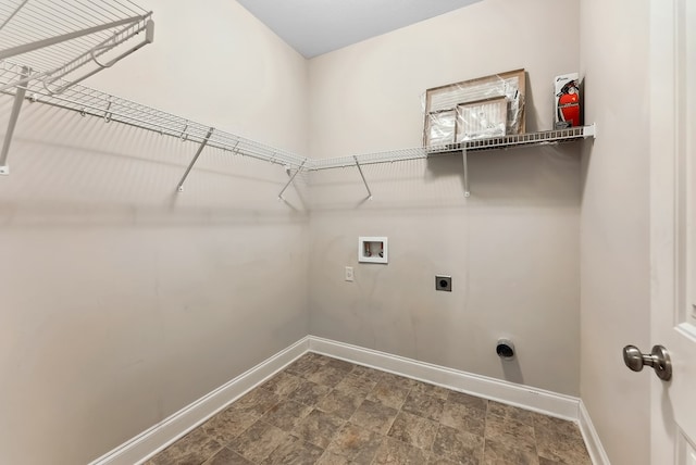 clothes washing area featuring hookup for an electric dryer and washer hookup