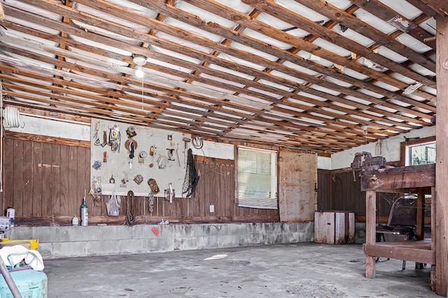 miscellaneous room featuring unfinished concrete floors