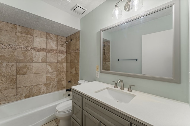1506 Lokey Dr, Columbus, GA 31904 - bathroom featuring toilet, vanity, shower / tub combination, and a textured ceiling