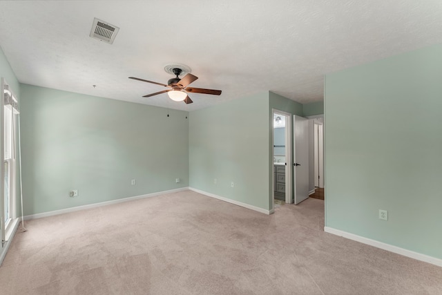1506 Lokey Dr, Columbus, GA 31904 - empty room featuring ceiling fan, light carpet, and baseboards