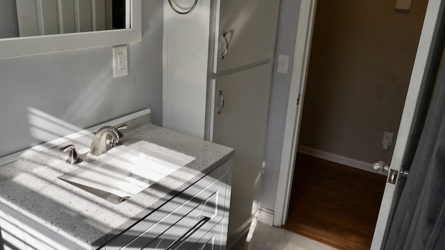 bathroom featuring hardwood / wood-style flooring and sink