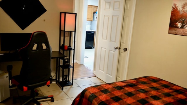 bedroom with light tile patterned floors