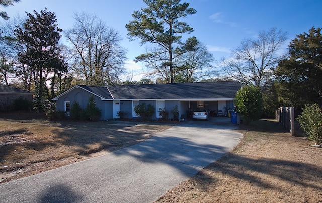 view of front facade with a carport