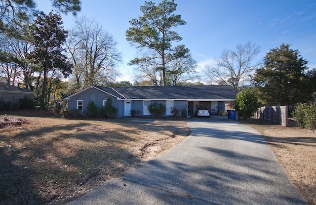 single story home with a carport