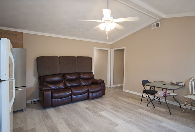 living room featuring ceiling fan, crown molding, light hardwood / wood-style flooring, and lofted ceiling with beams