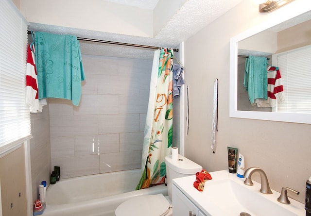 full bathroom with toilet, vanity, and shower / bathtub combination with curtain