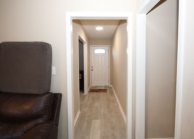 hallway featuring light hardwood / wood-style floors