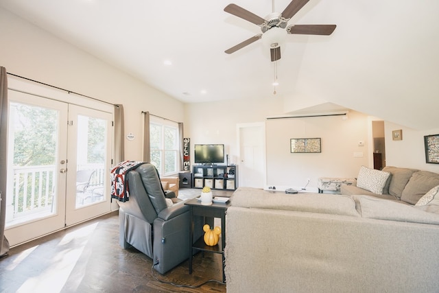 living room with dark hardwood / wood-style flooring, ceiling fan, and french doors