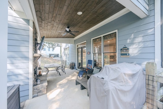 view of patio / terrace with area for grilling and ceiling fan