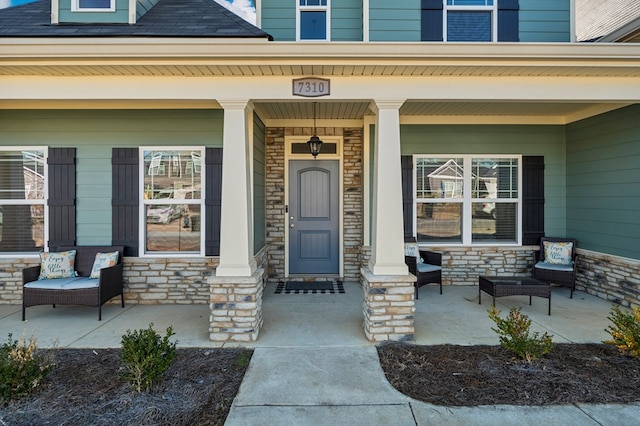 property entrance featuring covered porch