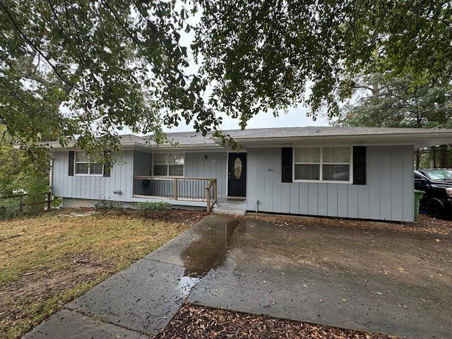 ranch-style house with covered porch