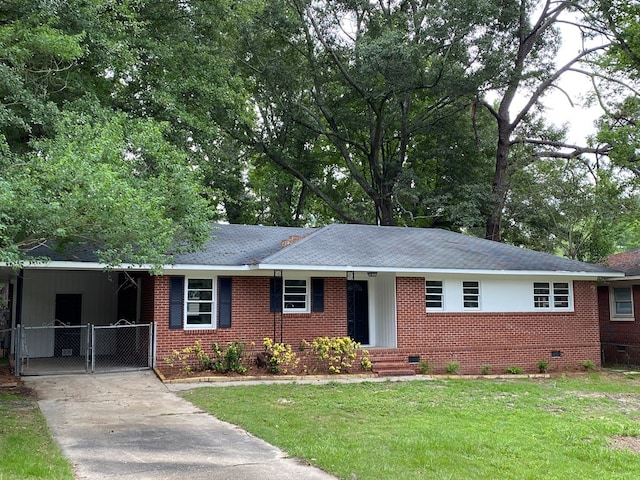 ranch-style house with a carport and a front yard