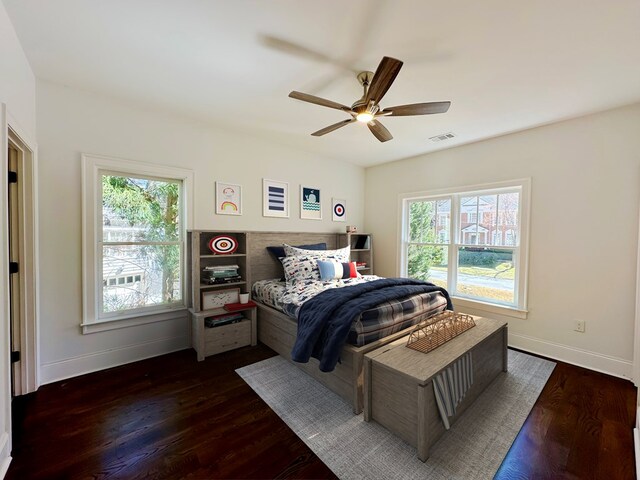 906 NE Winall Down Rd, Atlanta, GA 30319 - bedroom featuring multiple windows, dark wood-type flooring, and ceiling fan