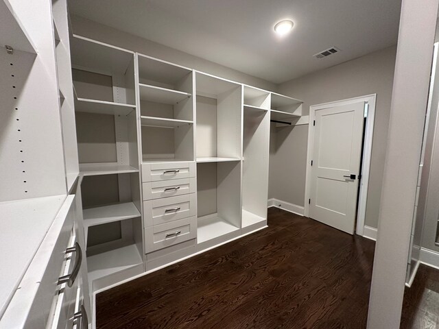 906 NE Winall Down Rd, Atlanta, GA 30319 - spacious closet featuring dark wood finished floors