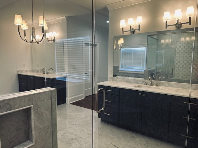 906 NE Winall Down Rd, Atlanta, GA 30319 - full bath with a chandelier, two vanities, marble finish flooring, and a stall shower