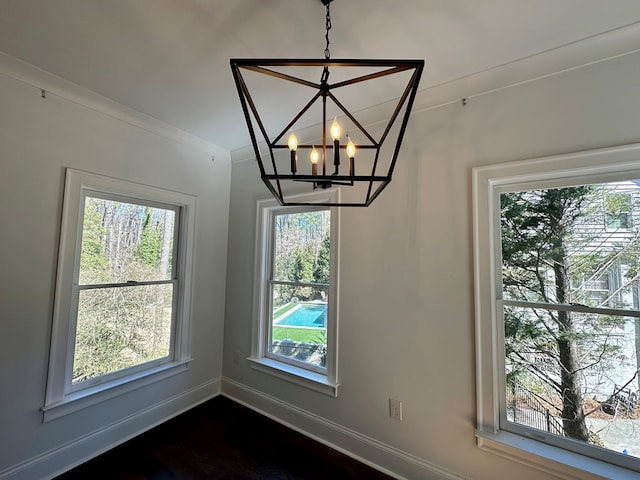 906 NE Winall Down Rd, Atlanta, GA 30319 - unfurnished dining area with a chandelier and dark wood-style floors