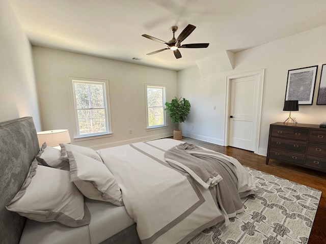 906 NE Winall Down Rd, Atlanta, GA 30319 - bedroom with dark wood-style flooring and ceiling fan
