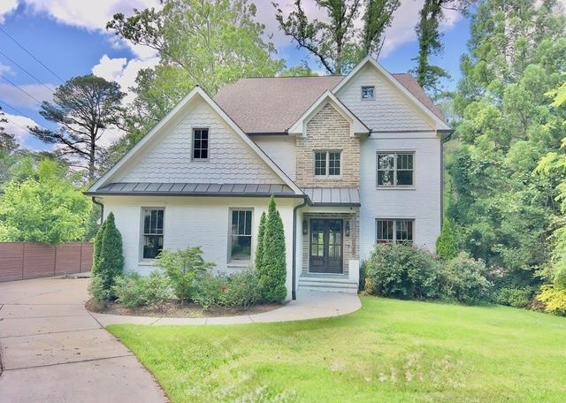 906 NE Winall Down Rd, Atlanta, GA 30319 - craftsman inspired home featuring a standing seam roof