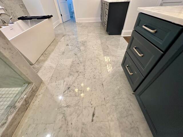 906 NE Winall Down Rd, Atlanta, GA 30319 - kitchen view of baseboards and light countertops