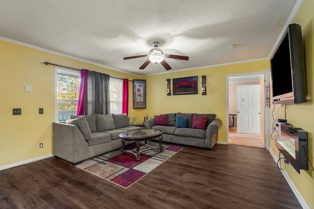 living room featuring a textured ceiling, ceiling fan, dark hardwood / wood-style floors, and ornamental molding