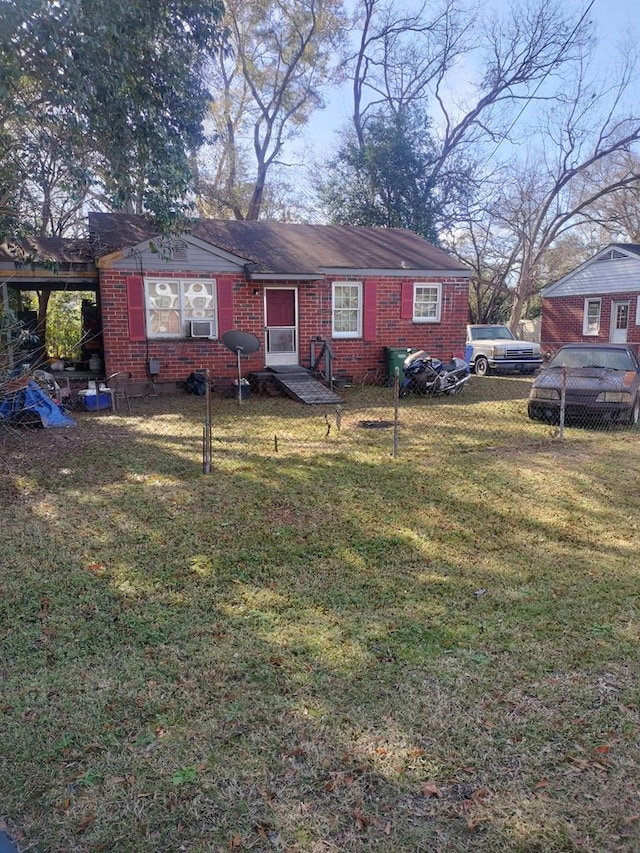 ranch-style house with a front yard