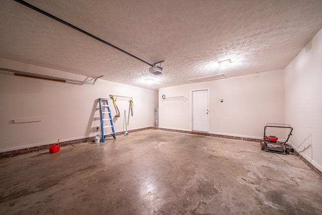 4021 Shade Valley Dr, Columbus, GA 31909 - garage with a garage door opener and baseboards