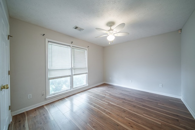 4021 Shade Valley Dr, Columbus, GA 31909 - unfurnished room with wood finished floors, a ceiling fan, and a textured ceiling
