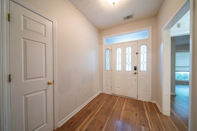 4021 Shade Valley Dr, Columbus, GA 31909 - entryway featuring hardwood / wood-style flooring and a textured ceiling