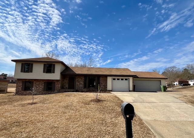 split level home with a garage