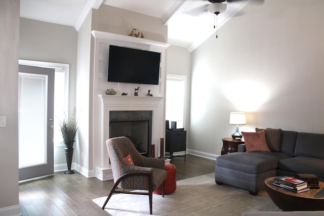 406 Lakeview Way, Lagrange, GA 30240 - living area featuring wood finished floors, a tiled fireplace, plenty of natural light, and crown molding