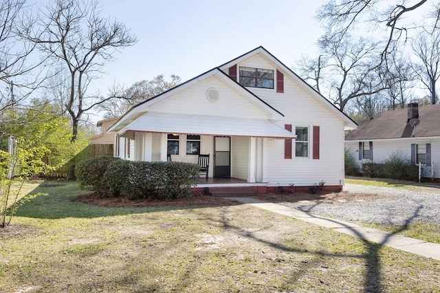 2418 34th St, Valley, AL 36854 - bungalow with a front lawn and covered porch
