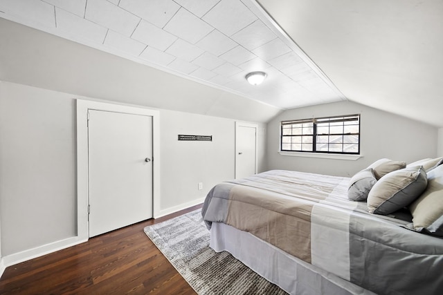 2418 34th St, Valley, AL 36854 - bedroom featuring wood finished floors, baseboards, and vaulted ceiling