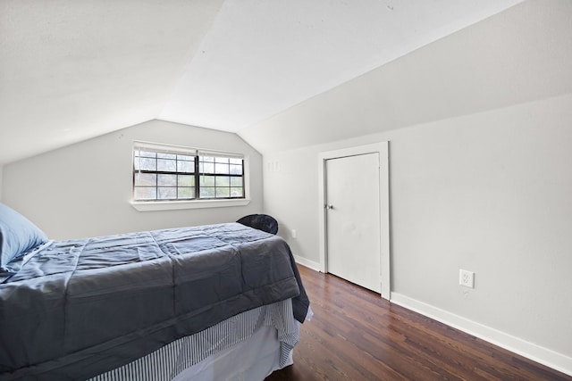 2418 34th St, Valley, AL 36854 - bedroom with wood finished floors, baseboards, and vaulted ceiling