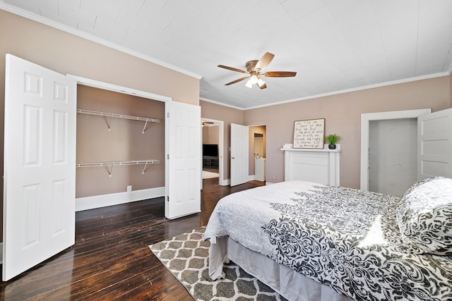 2418 34th St, Valley, AL 36854 - bedroom with a closet, baseboards, a ceiling fan, hardwood / wood-style flooring, and crown molding