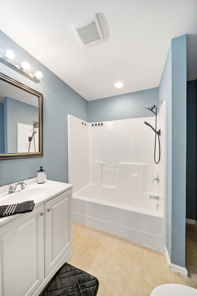 2418 34th St, Valley, AL 36854 - bathroom with visible vents, baseboards, shower / bath combination, vanity, and tile patterned floors