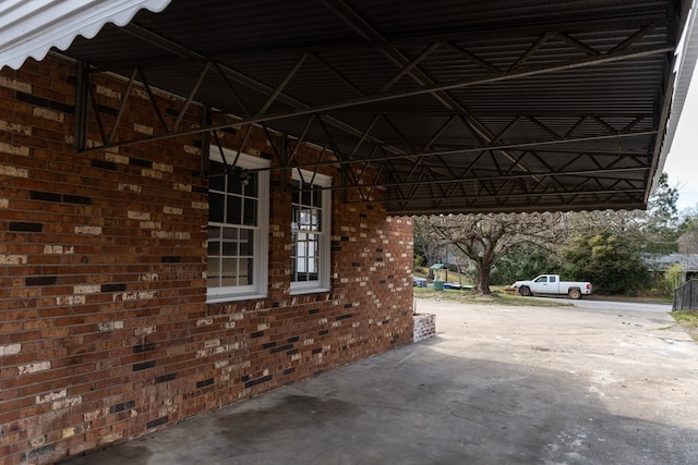 view of parking / parking lot featuring driveway