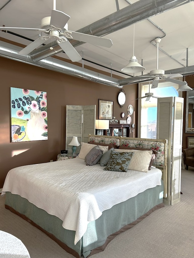 bedroom with ceiling fan and carpet