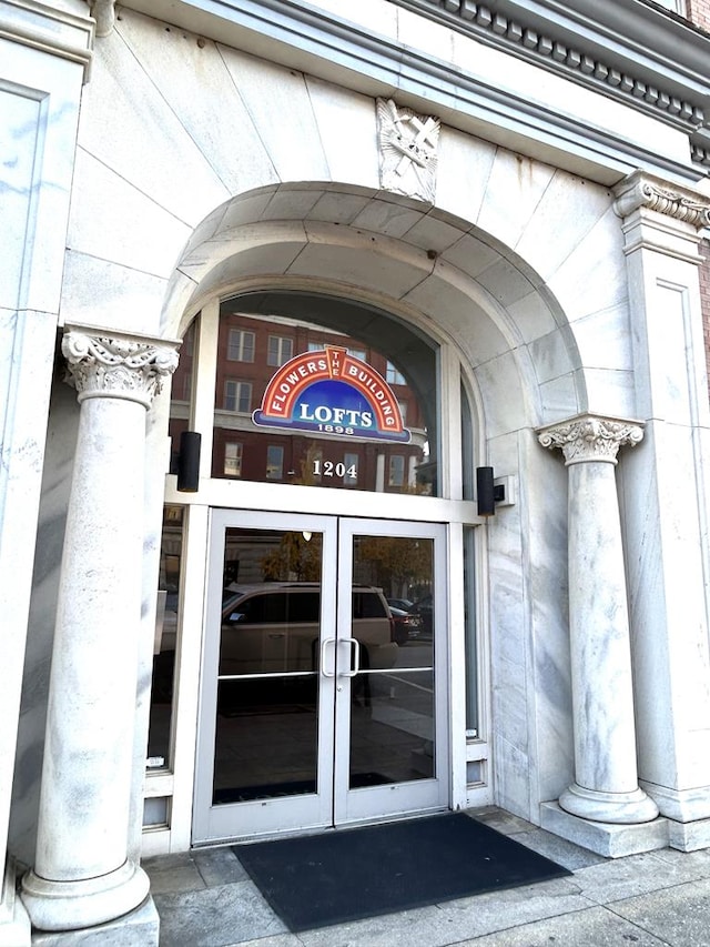 view of exterior entry featuring french doors