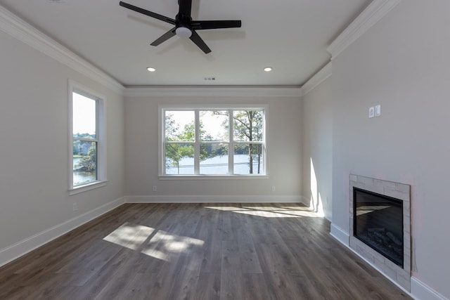 unfurnished living room featuring ceiling fan, dark hardwood / wood-style flooring, and ornamental molding