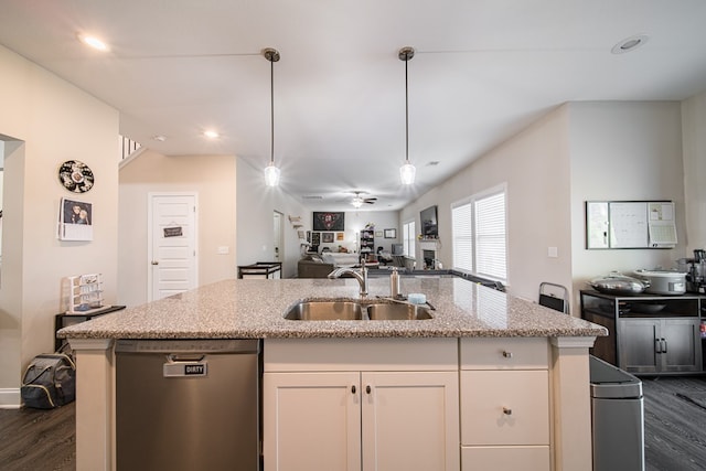 kitchen with dark wood-type flooring, white cabinets, sink, stainless steel dishwasher, and ceiling fan