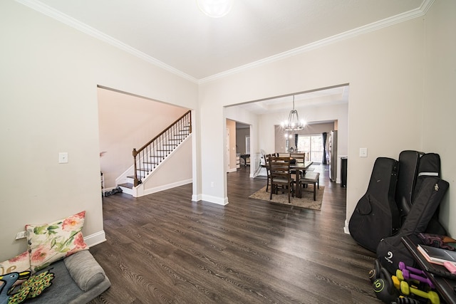 interior space with crown molding, dark hardwood / wood-style flooring, and a notable chandelier