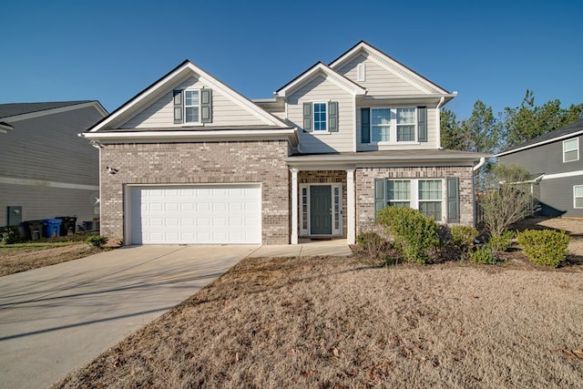 view of front of property with a garage