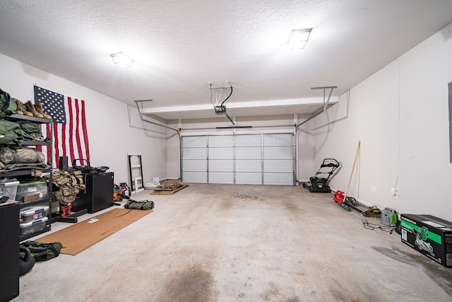 garage featuring a garage door opener