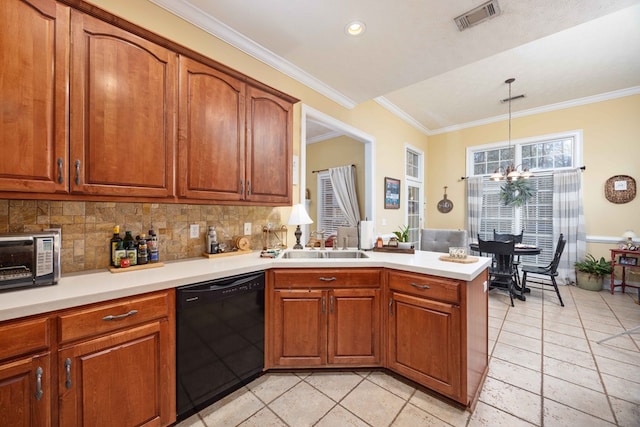 kitchen with pendant lighting, sink, backsplash, black dishwasher, and kitchen peninsula