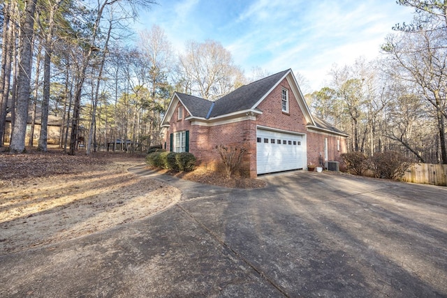 view of property exterior featuring a garage