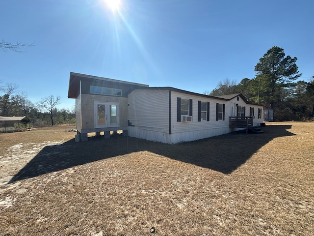 view of front of home with cooling unit