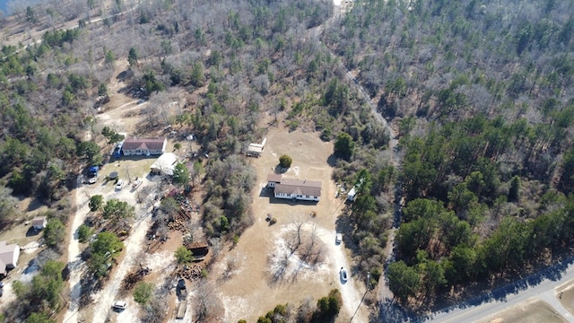 drone / aerial view with a forest view